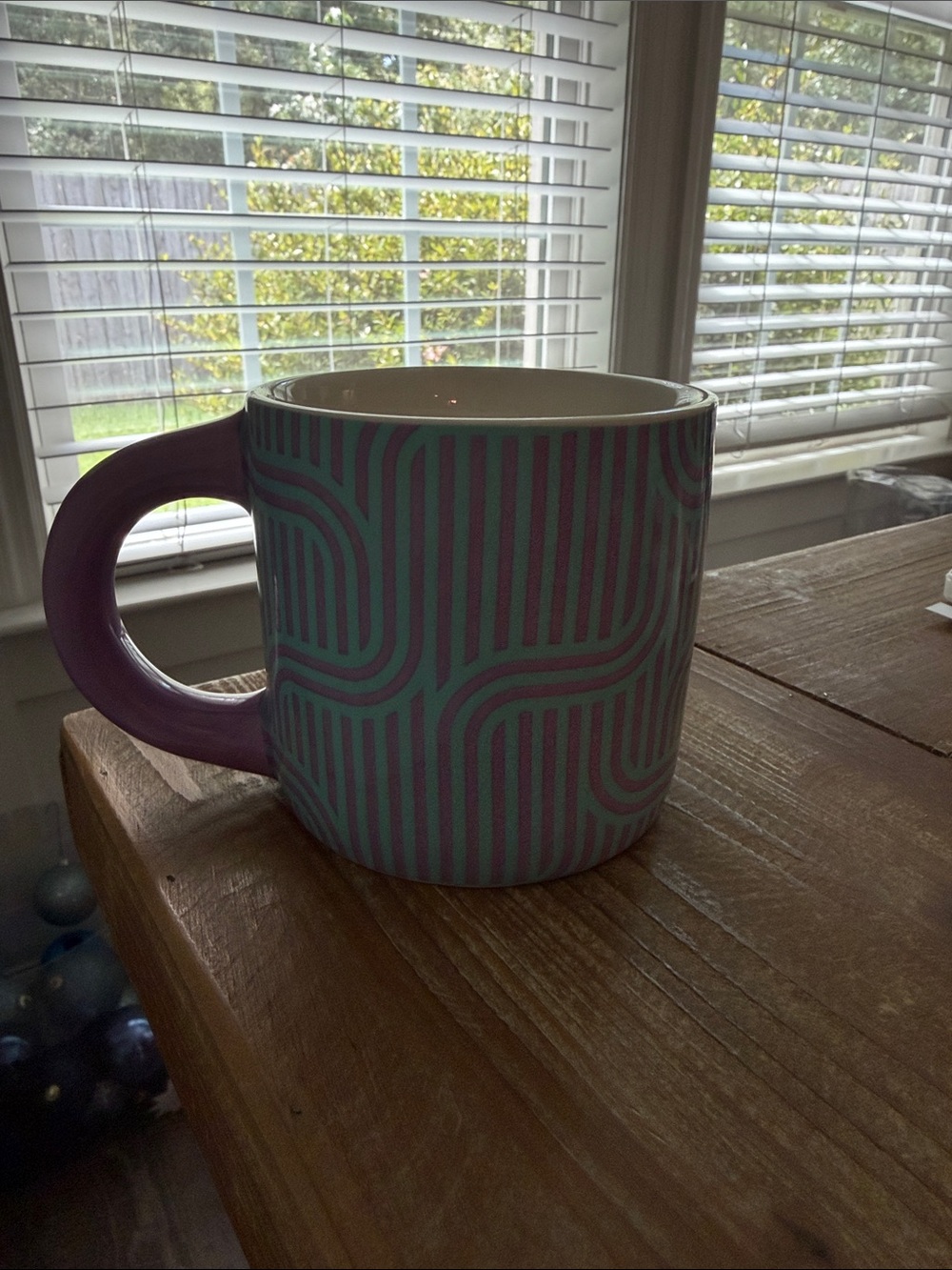 Striped Ceramic Mug with Purple Handle and Teal Pattern